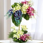 Lilies and Orchids in a Basket